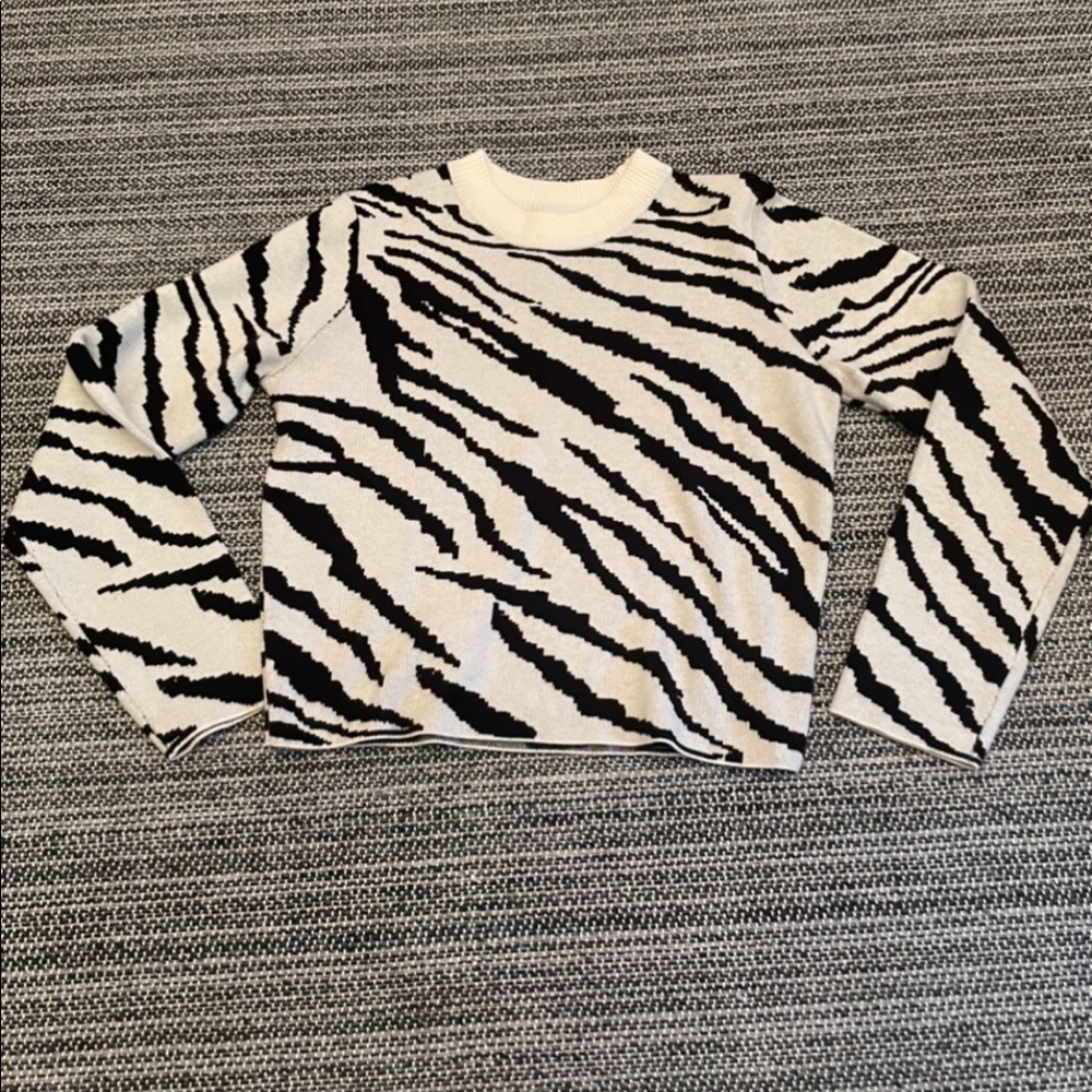 Women’s zebra print sweater.